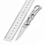 মিনি পকেট ক্যারাবিনার ফোল্ডিং নাইফ | স্টেইনলেস স্টিল ব্লেড ও স্টিল হ্যান্ডেল | ক্যাম্পিং, হান্টিং ও আউটডোর EDC টুলস - Image 2